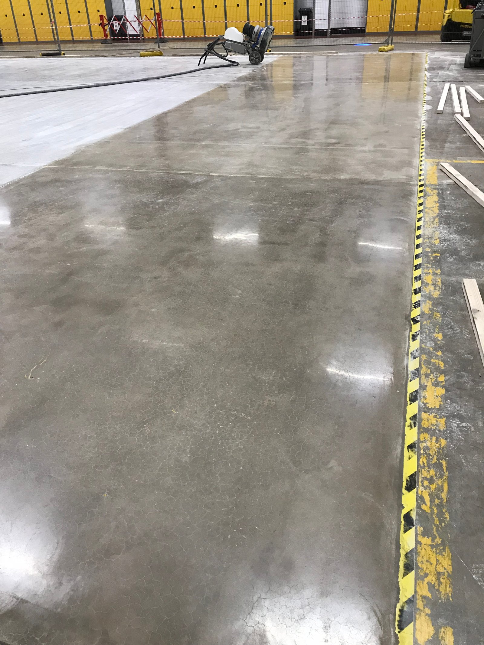 Industrial polished concrete — distribution warehouse grind and seal
