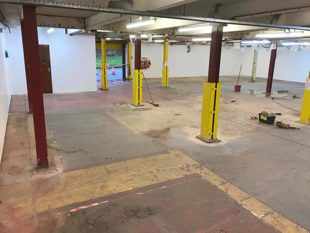 Before - worn industrial floor