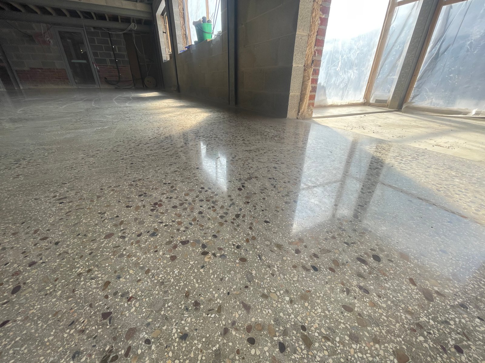 Commercial polished concrete — fitness studio high gloss finish