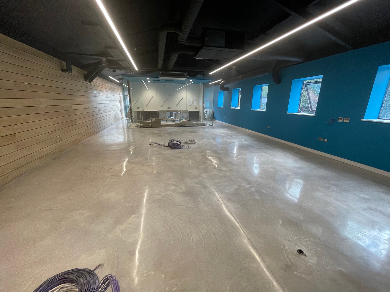 Commercial polished concrete — fitness studio satin finish
