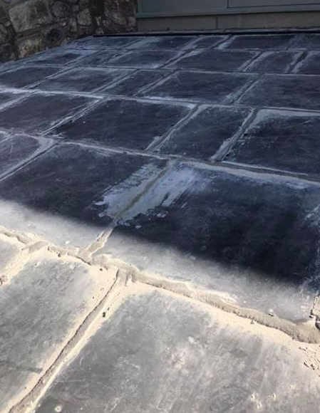 Slate floor before restoration - outdoor surface dull and weathered
