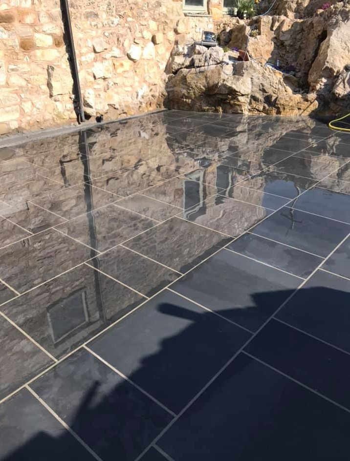 Slate floor after restoration - deep colour enhanced and sealed UK
