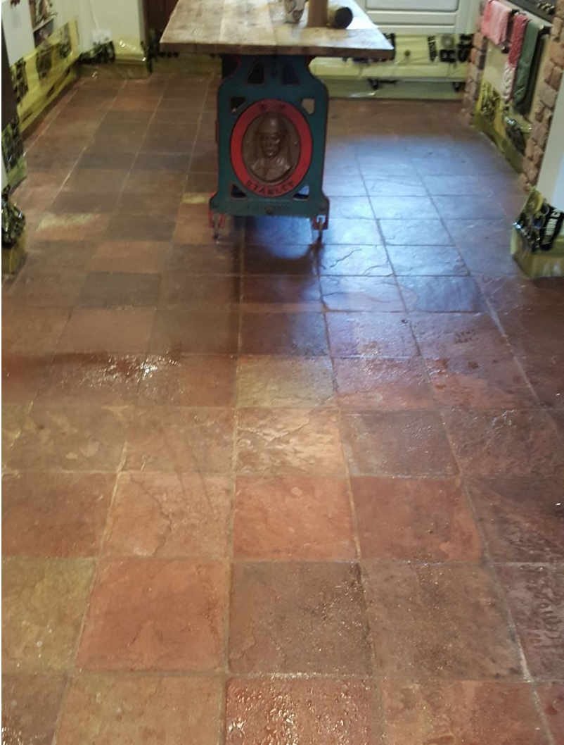Indoor slate floor before restoration - dull and worn surface