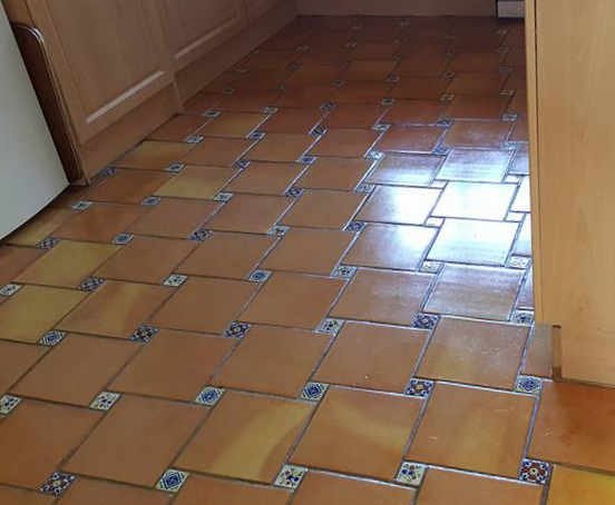 Terracotta floor after restoration - cleaned, recoloured and sealed