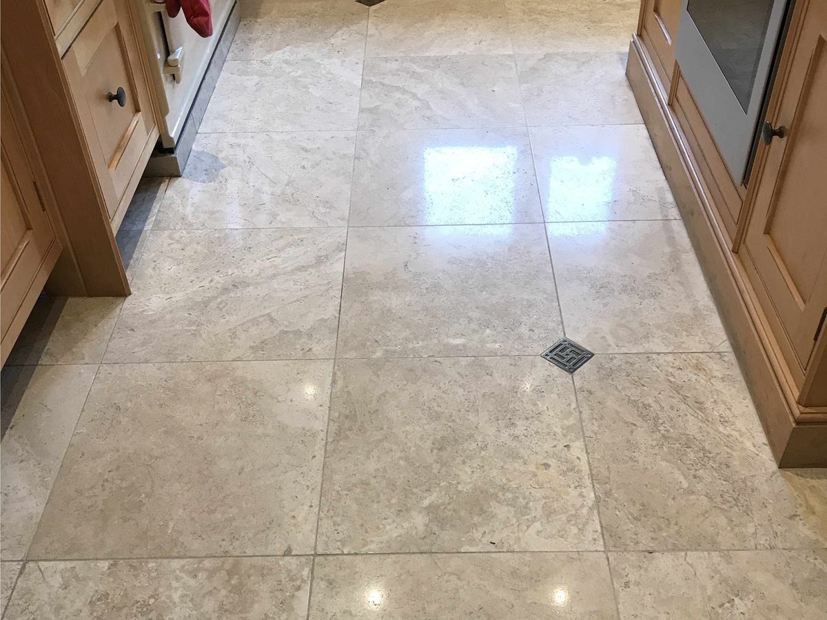 Travertine floor after stone restoration - filled, honed and polished