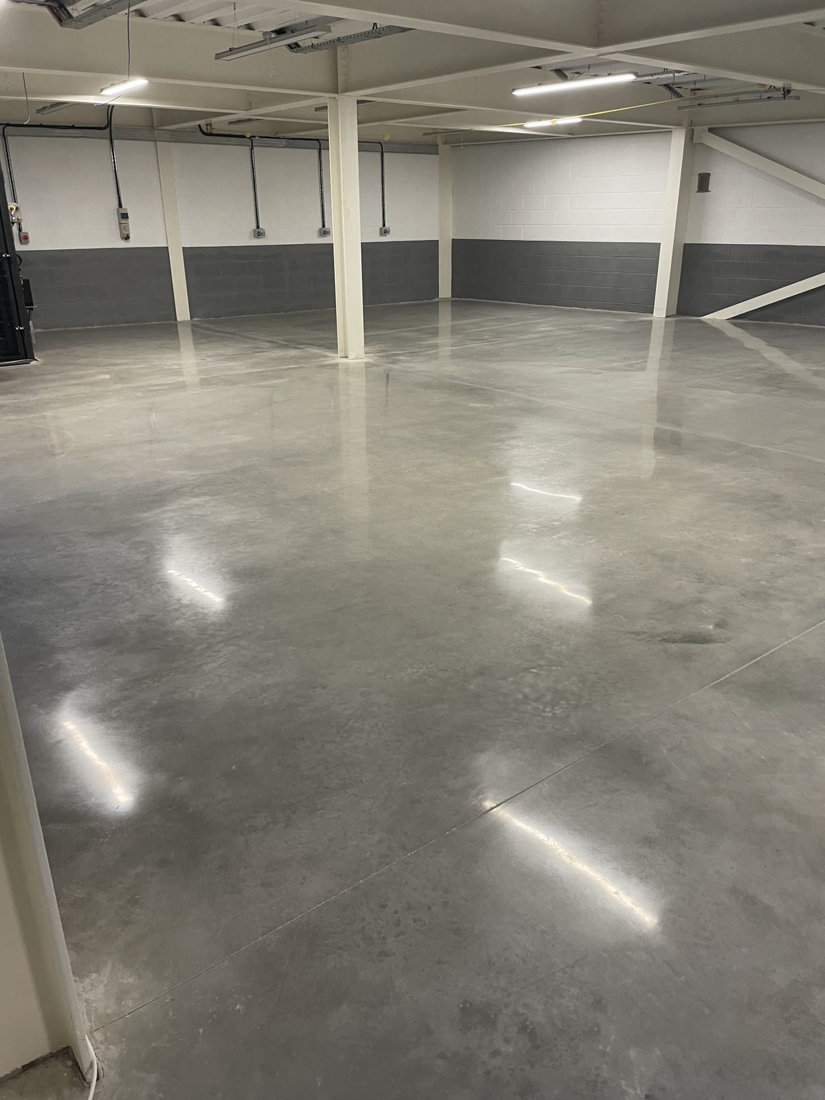 Commercial polished concrete - exposed aggregate finish in barn conversion