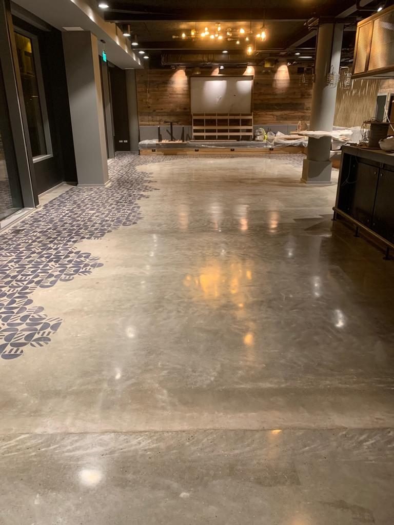 Commercial polished concrete restaurant floor - decorative tile art inlay