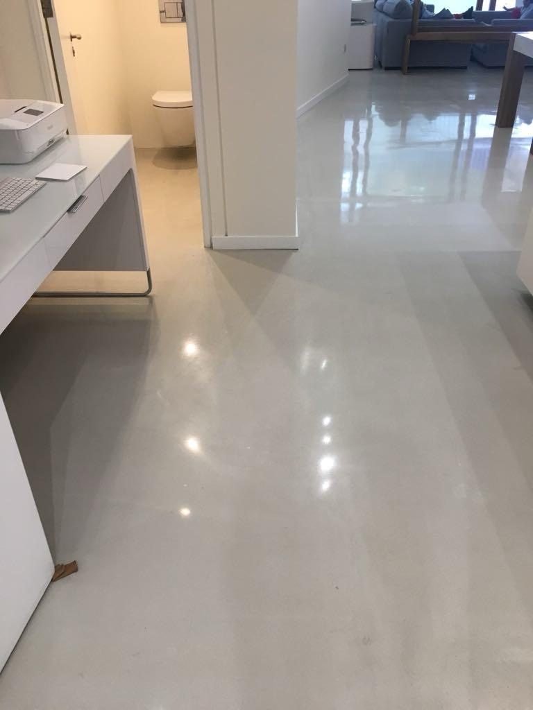 Concrete overlay across large open plan office fit-out UK