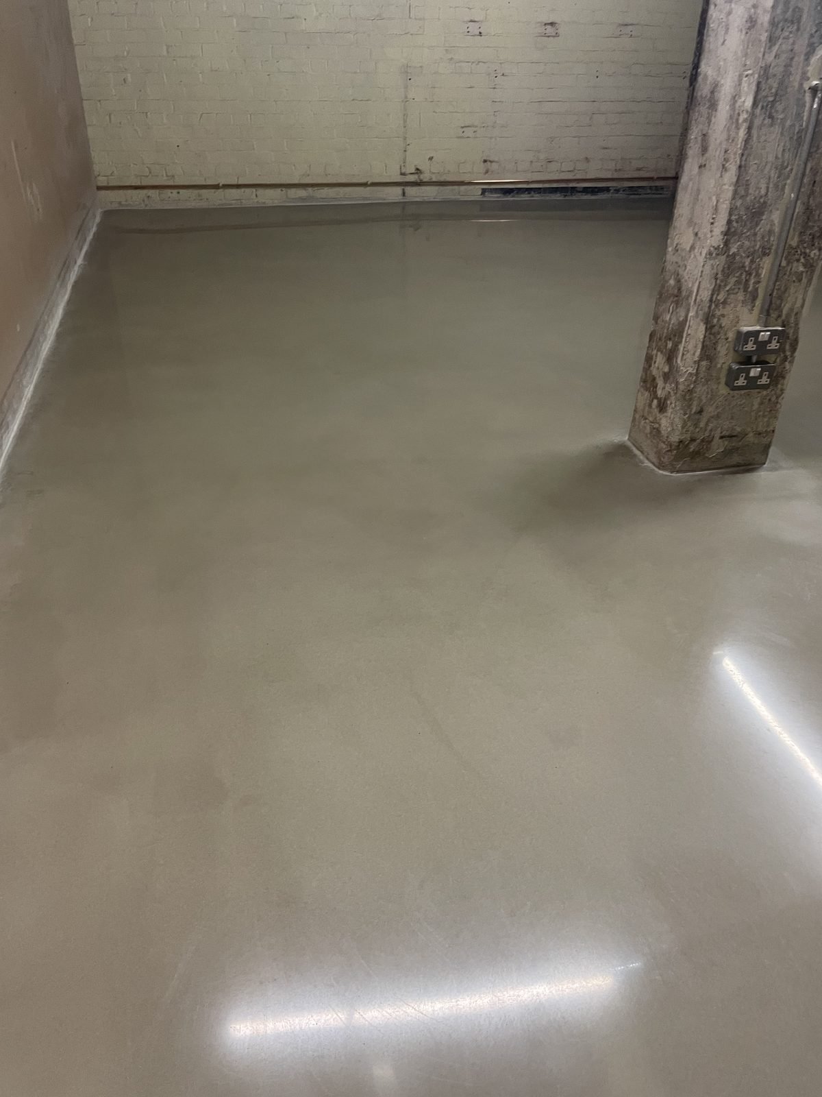 Polished concrete overlay - open plan living and dining room UK