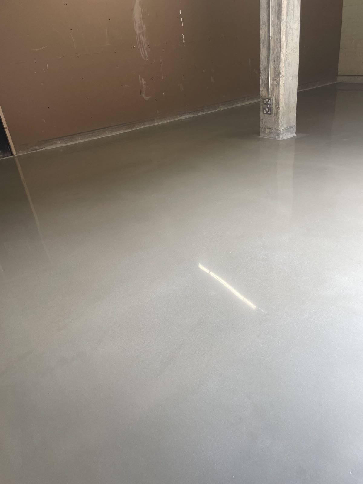 Concrete overlay smooth finish - no-aggregate commercial installation