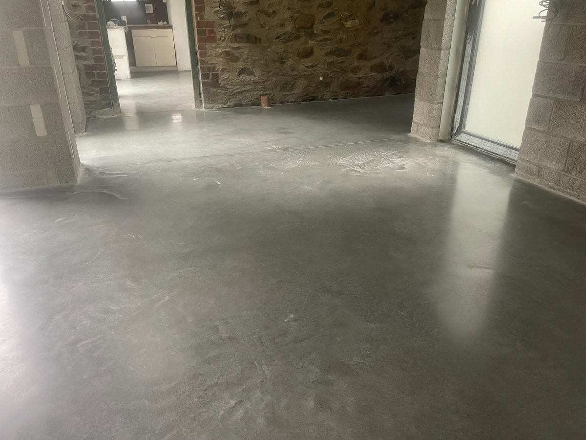 Mid grey low sheen polished concrete floor - residential kitchen