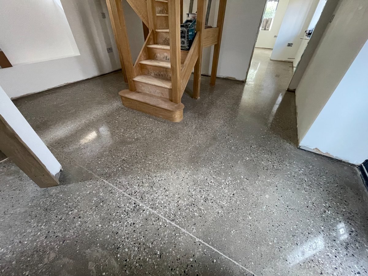 Full aggregate polished concrete hallway - residential installation