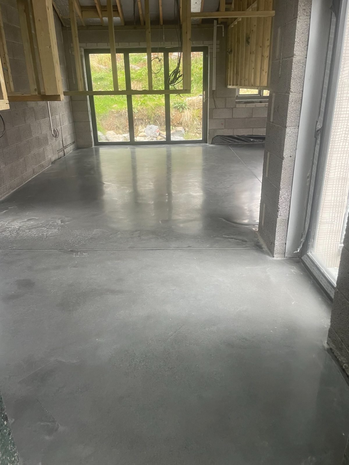 Mid grey low sheen polished concrete - home extension floor