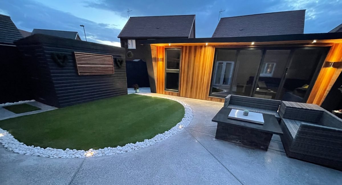 Polished concrete patio - exterior evening lighting residential