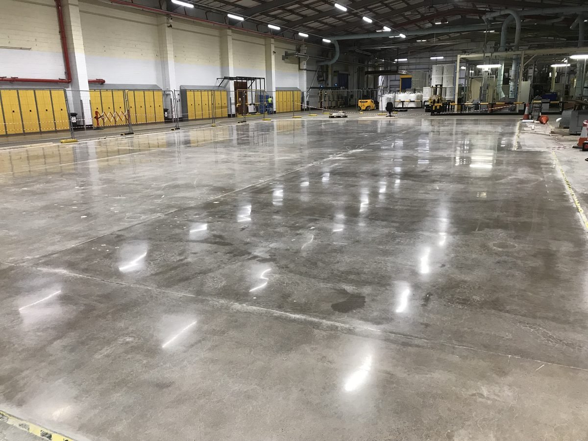 Industrial polished concrete floor - large scale grind and seal warehouse