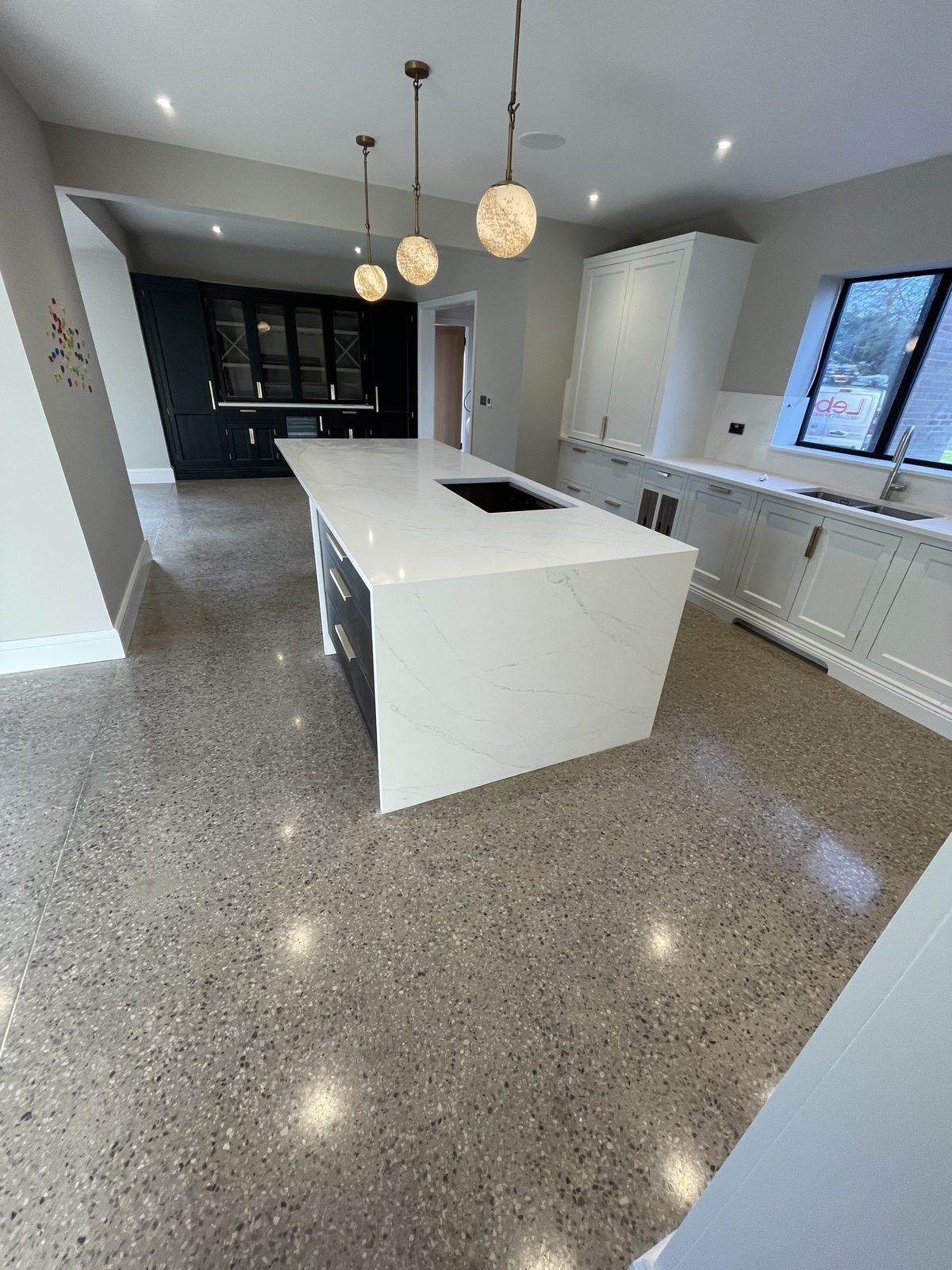 Residential polished concrete kitchen floor - grey low sheen finish