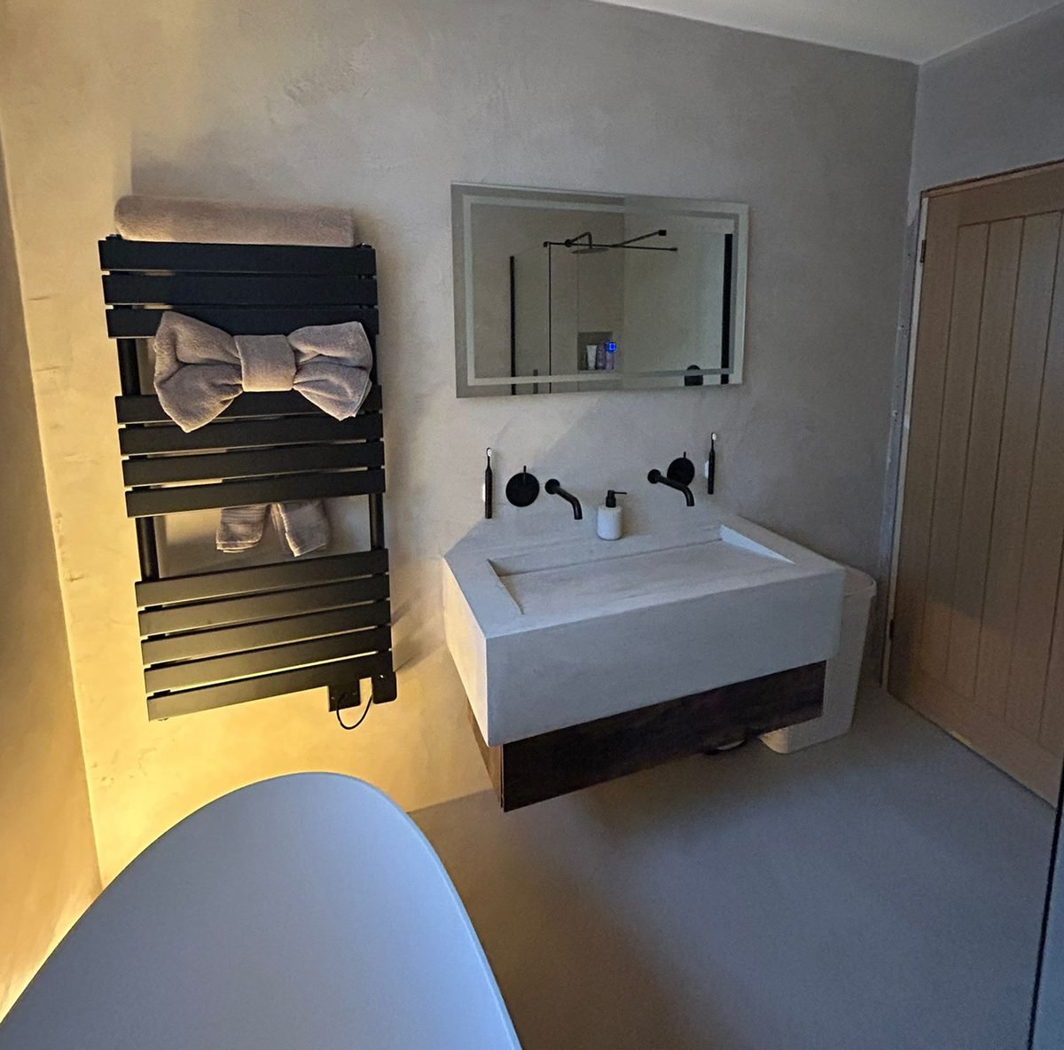 Bespoke microcement and tile combination - bathroom installation