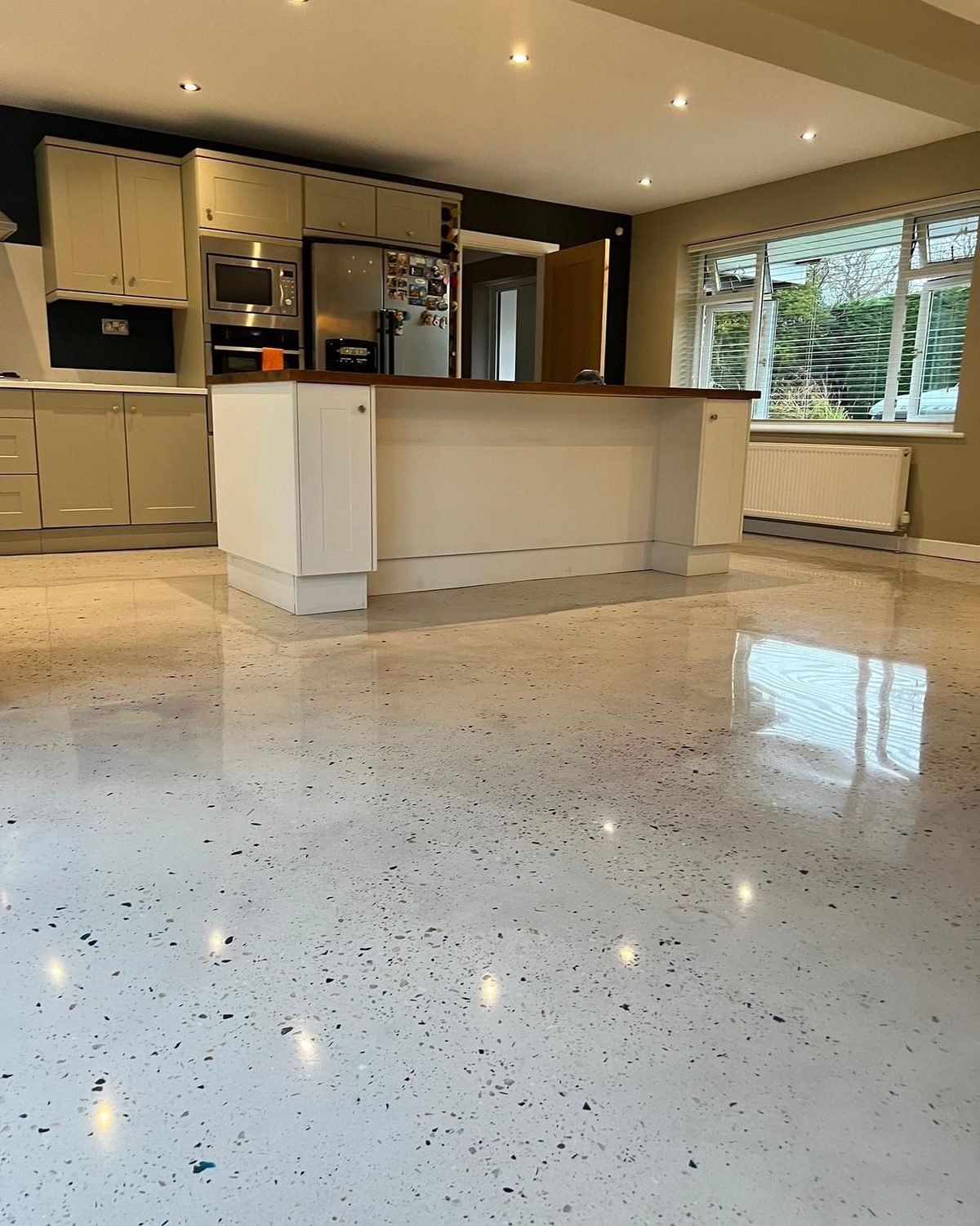 Cream polished concrete floor - domestic residential installation